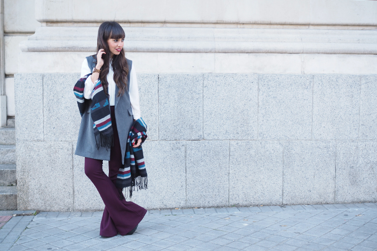 Street style, winter outfit, flared pants, burgundy, ethnic scarf, vest