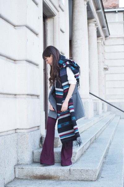 Street style, winter outfit, flared pants, burgundy, ethnic scarf, vest