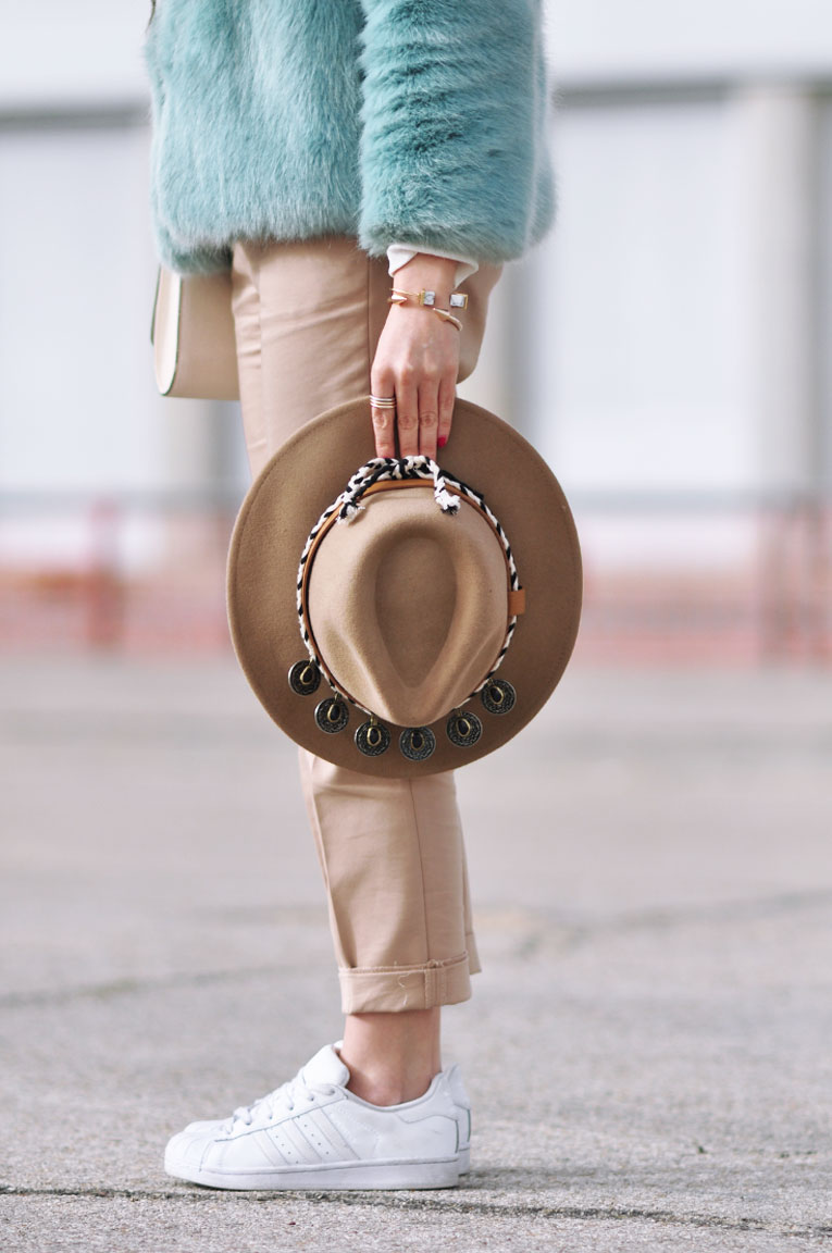 Street style, soft colors, faux fur blue coat, boho coins hat, white sneakers, comfy outfit