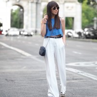 Street style, white palazzo pants, denim crop top, rounded sunglasses,