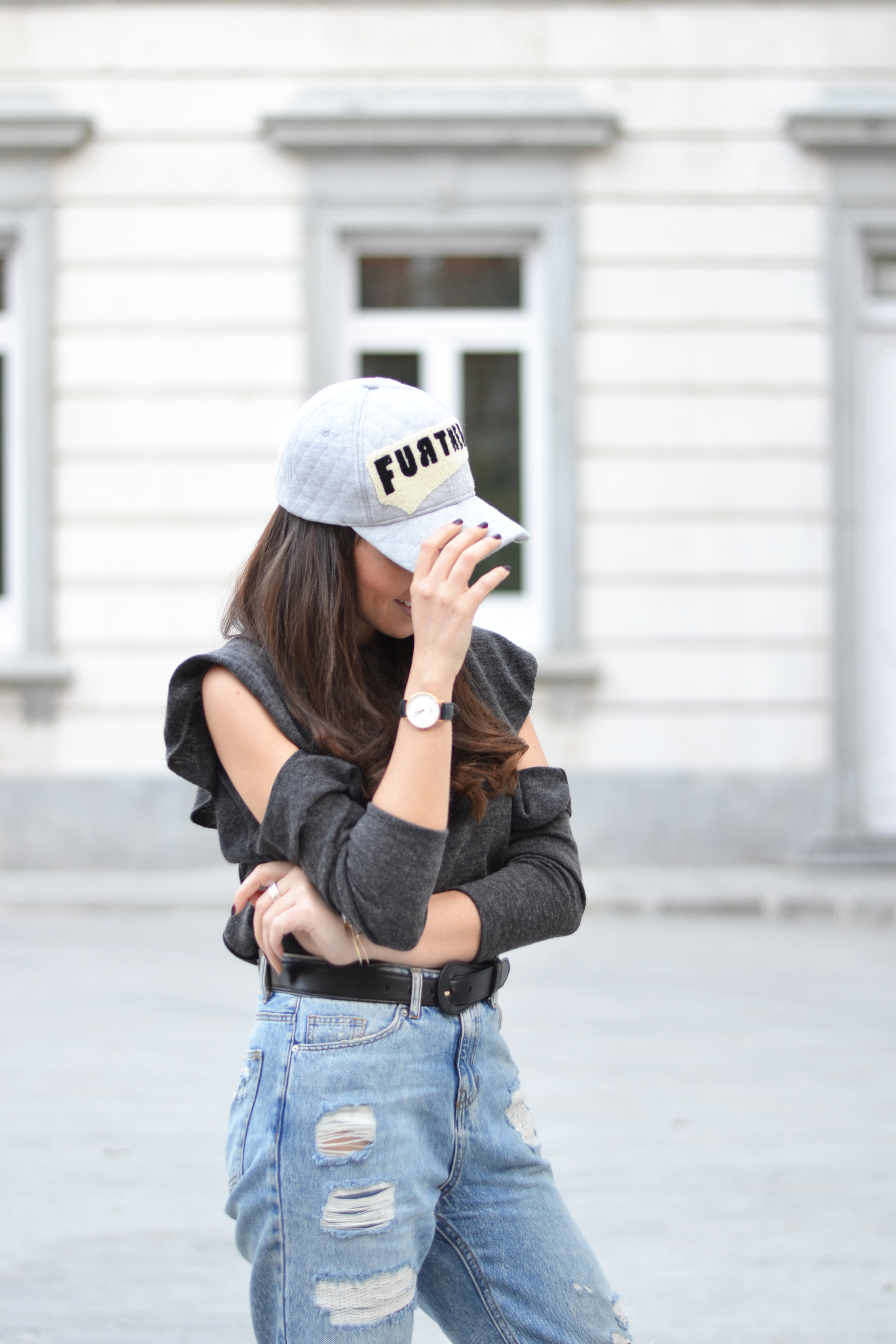cut out sweater, mom jeans, cap outfit, street style